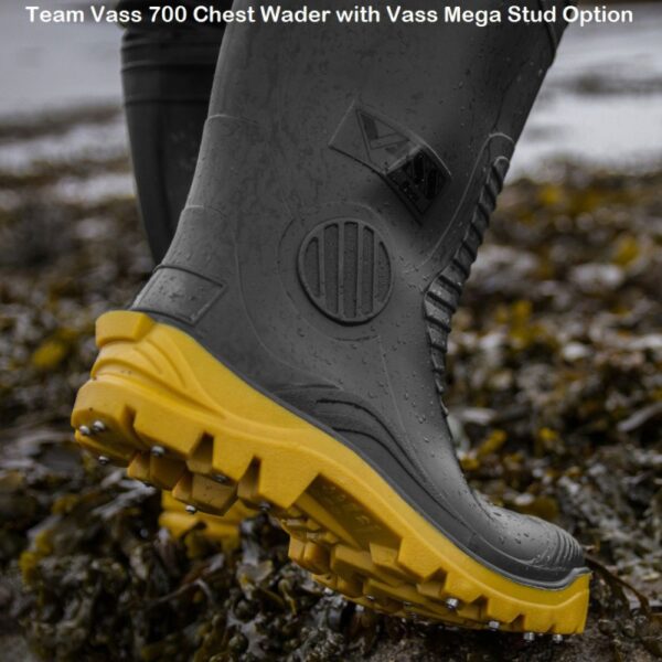 Vass waterproof wader boot with yellow sole on seaweed.