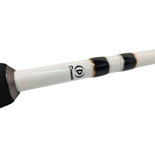 White fishing rod with black and gold accents.