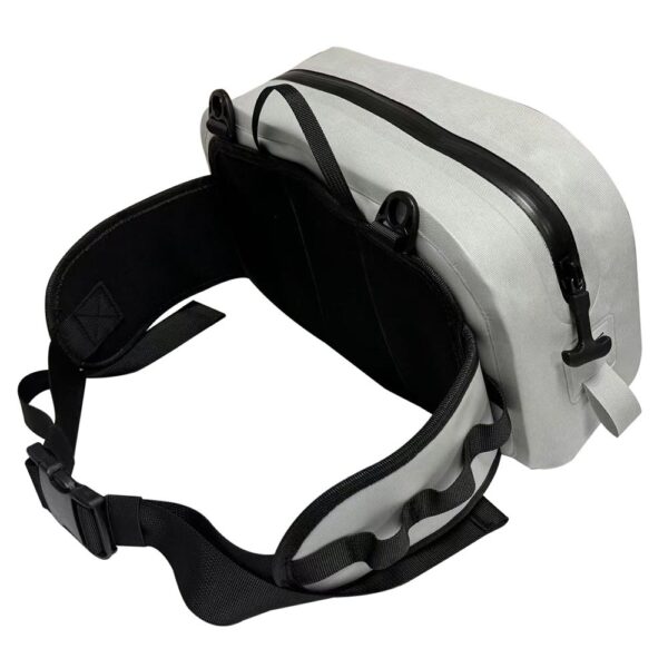 White waist bag with black straps and zipper.