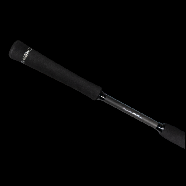 Fishing rod with black handle, isolated on black.